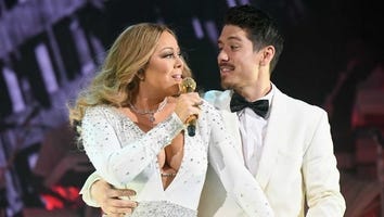 Mariah Carey Lights Up Empire State Building Holiday Lights, Gets Close to Bryan Tanaka on Stage