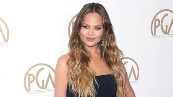 Chrissy Teigen Shuts Down 'Complete Witch' Who Questioned Her Fertility Struggles