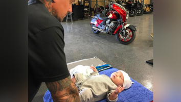 Pink's Husband, Carey Hart, Changes 8-Week-Old Son's Diaper in the Bike Shop