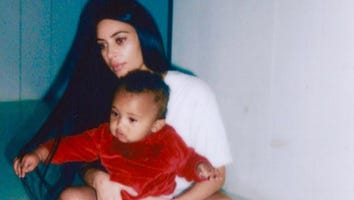 Kim Kardashian and Saint West Adorably Cozy Up in Matching Yeezys to Watch Kendall's Runway Walk