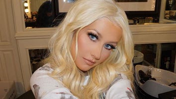 Christina Aguilera and Matthew Rutler Adorably Give Daughter Summer Rain a 'Kiss Attack'