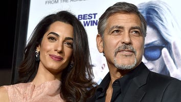 Pregnant Amal Clooney Stuns in Floral Look as She and George Clooney Leave Paris