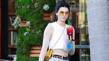 Kendall Jenner Channels the '70s in Funky Aviators, Crop Top and Smiley Face-Patched Daisy Dukes