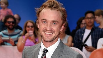 Tom Felton Sings and Plays Guitar on the Streets of Prague and No One Notices - Watch!