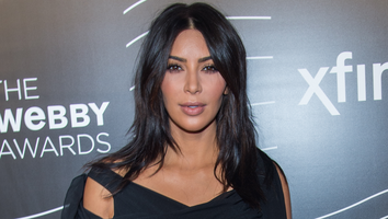 Kim Kardashian Sports a Sheer Bra and No Shirt, Stays Silent on Rob Kardashian Drama