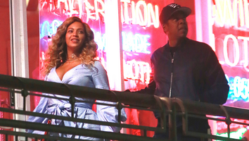 Beyonce Glows in Cleavage-Baring Dress For Romantic Date With JAY-Z