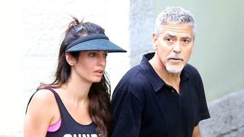 George and Amal Clooney Hold Hands After Tennis Match in Italy -- See the Pic!