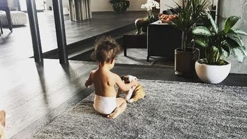Chrissy Teigen and John Legend's Daughter Luna Adorably Pets Her New Bulldog Puppy