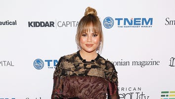 Chrissy Teigen Refuses to Let Christmas Go in Adorable Family Photo