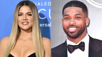 Pregnant Khloe Kardashian Piles on PDA With Tristan Thompson on New Year's Eve: 'He's Sooooo Handsome'