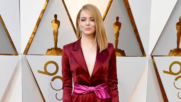 Emma Stone Elegantly Rocks Silk Tuxedo at 2018 Oscars