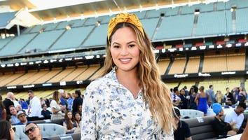 Chrissy Teigen Shares Hilarious Videos of Luna Getting Her Passport Photo Taken -- Watch