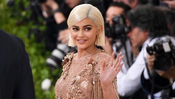 Kylie Jenner Shows Off Her Curves In A Sports Bra and Tight Leggings