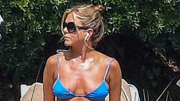 Jennifer Aniston Looks Super Fit in Blue Bikini While Lounging Poolside in Italy