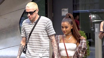 Ariana Grande Hold Hands With Pete Davidson While Wearing His Dad’s Badge on Her Neck