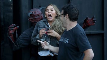 Chrissy Teigen Is All of Us as She Screams Her Way Through a Haunted House