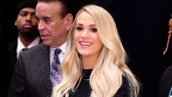 Carrie Underwood Styles Her Baby Bump in Chic Curve-Hugging Black Dress