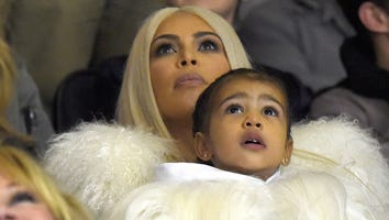 North West Tries on Mom Kim Kardashian’s Neon Flame Heels in Cute Pic