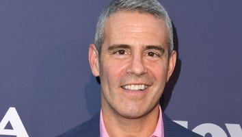Andy Cohen's Baby Snuggles Up to Mark Consuelos in $400 Fendi Pants