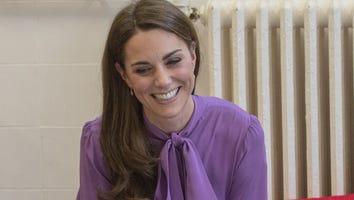 Kate Middleton Plays With Babies During Visit to Children's Center in London