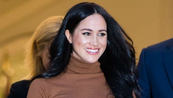 Meghan Markle Is All Smiles During Stroll With Archie After Royal Exit