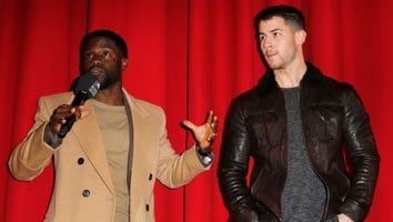 Watch Kevin Hart and Nick Jonas Run Off When Asked to Hold a Huge Snake