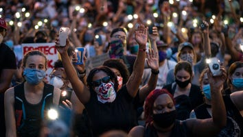Washington, D.C. Protestors Lead 'Lean on Me' Sing-Along in Front of the White House
