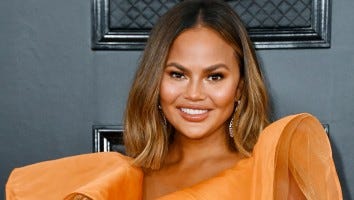 Chrissy Teigen Debuts New Finger Tattoos: See the Ink!