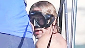 Brad Pitt Shows Off His Back Tattoos While Snorkeling With Rocker Flea