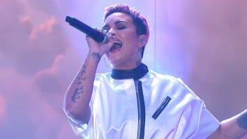 Demi Lovato Says She Cut Her Hair Off After Using It to Cover Her Body