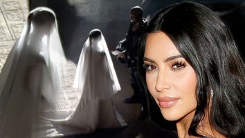 Kim Kardashian Wears Wedding Gown at Kanye West’s ‘Donda’ Event