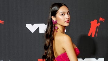 Olivia Rodrigo Wins First MTV VMA Award and Glows in Fuschia Dress on Red Carpet
