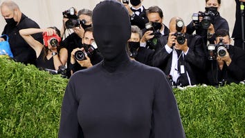Kim Kardashian Hits 2021 Met Gala in All-Black, Face-Covering Bodysuit