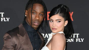 Kylie Jenner Shares Sweet Photo of Travis Scott Holding Their Newborn Son