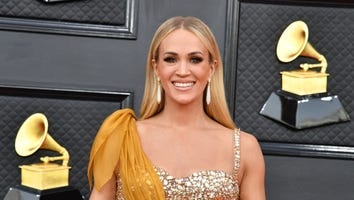 Carrie Underwood and Her Golden GRAMMYs Gown Catch Husband Mike Fisher's Eye