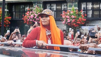 Nicki Minaj Is Bombarded by Fans in England, Pleads With Them to 'Get Into a Contained Space'