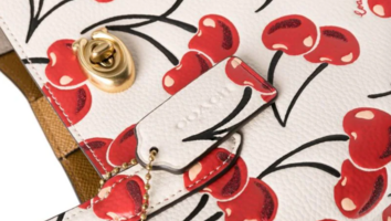 Coach's Cherry Print Handbag Collection Is Ripe for Spring and 70% Off Right Now