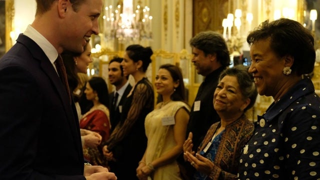 william looking at kate in gold dress Golden girl Kate dazzles in unseen photo from James Bond premiere