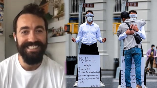 Blindfolded Jewish Man ‘Standing for Peace’ Gives Out Free Hugs (Exclusive) 