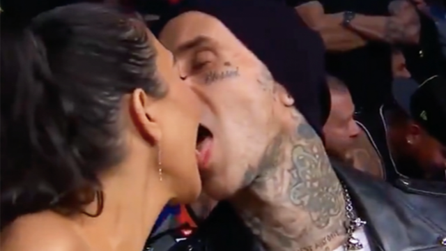 Kourtney Kardashian and Travis Barker Make Out for the Cameras at UFC 264
