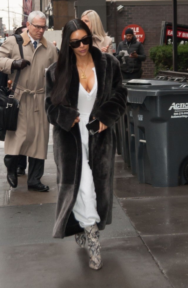 Kim Kardashian Rocks Luxurious Fur Coat and Edgy Snakeskin Booties in ...