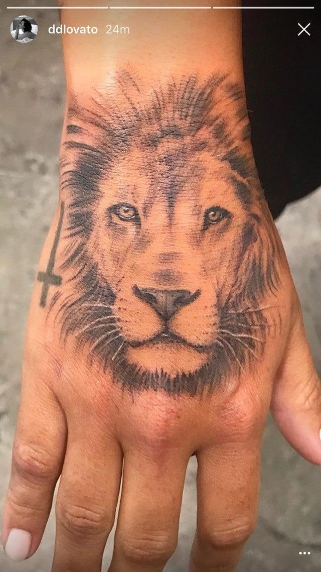 Demi Lovato Gets a Giant Lion Tattooed on Her Hand See 