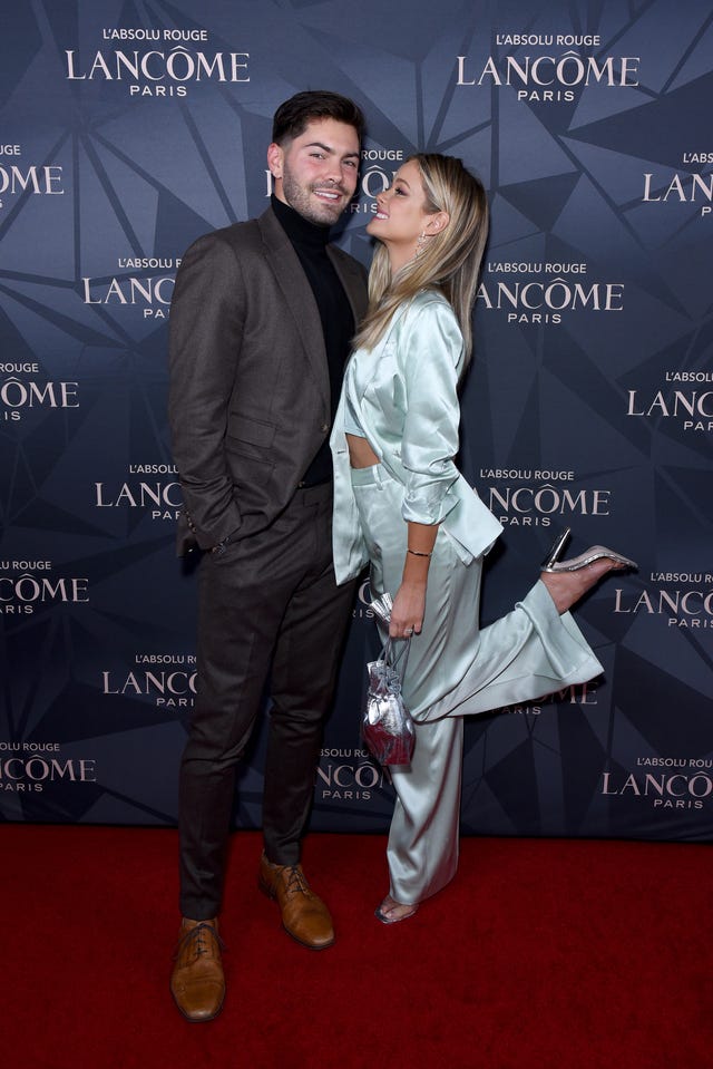 Dylan Barbour and Hannah Godwin at holiday party