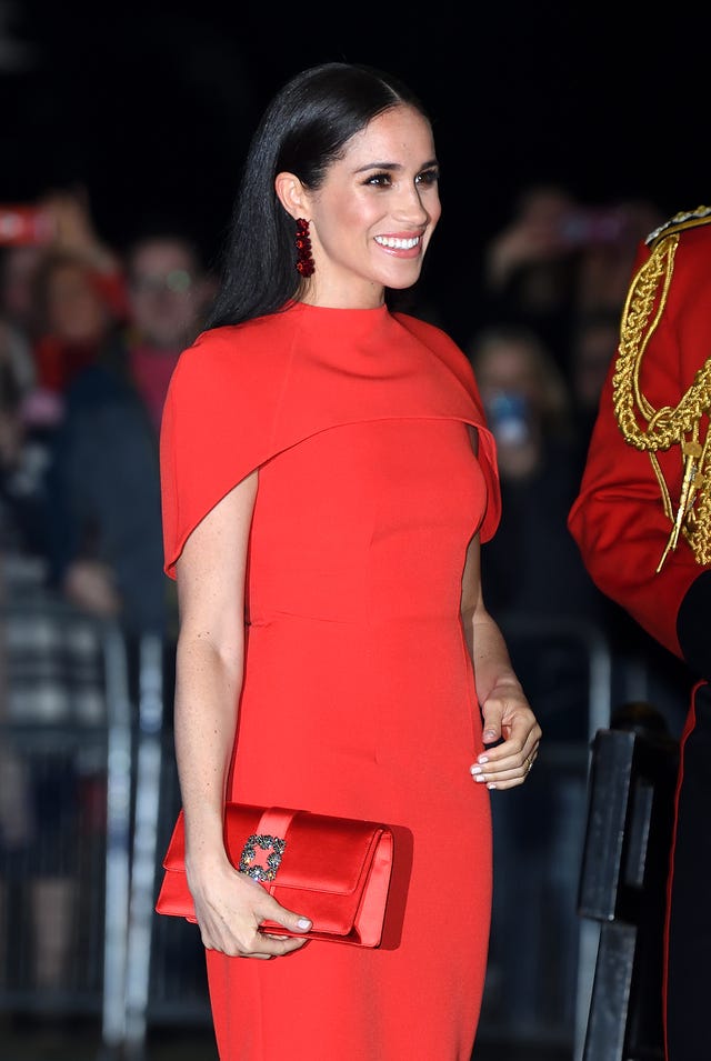 meghan markle in red in london on 3/7