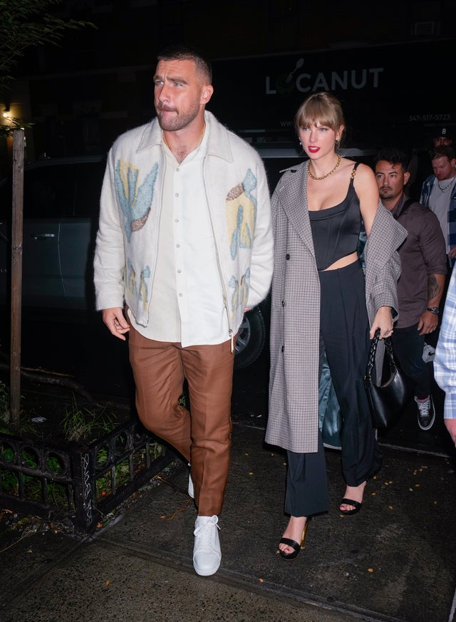Travis Kelce and Taylor Swift show a little PDA after sparking romance rumors
