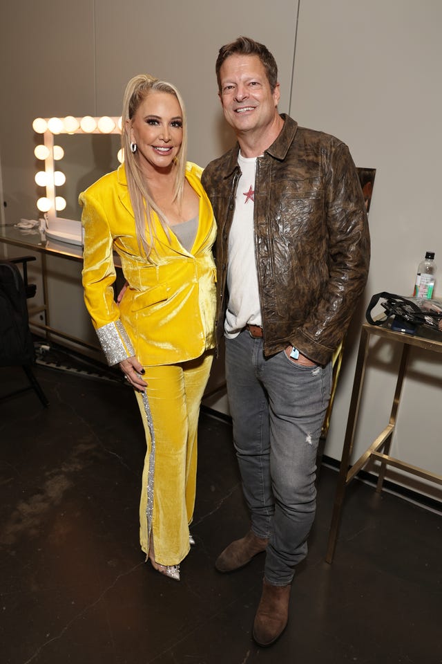 Shannon Beador and John Janssen pose together backstage at BravoCon 2023.