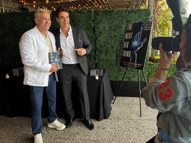Sam Champion and Rob Marciano