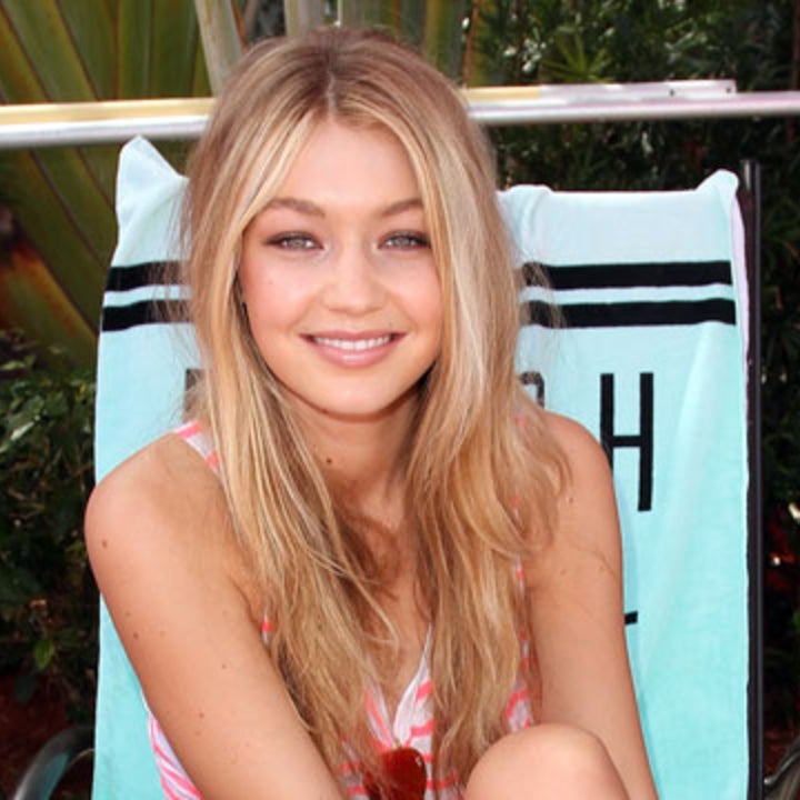 Gigi Hadid Goes Topless, Attempts to Explain How She's Related to Kendall Jenner