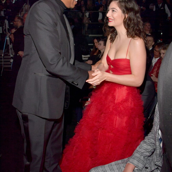 lorde red dress Lorde looking absolutely stunning in a beautiful red dress at the grammys ceremony in 2018 (where we all know she was snubbed). The last picture shows a feminist poem she wore