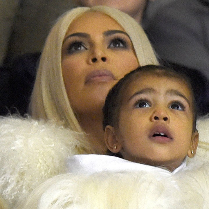 North West Tries on Mom Kim Kardashian’s Neon Flame Heels in Cute Pic
